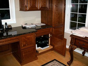 Desk features a slide out printer or fax door